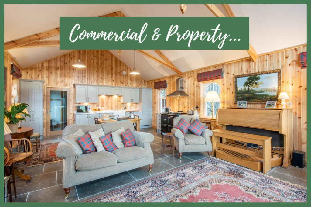 Interior of a converted church with wood panelling and green soft furnishings with the text 'commercial & property' overlaid